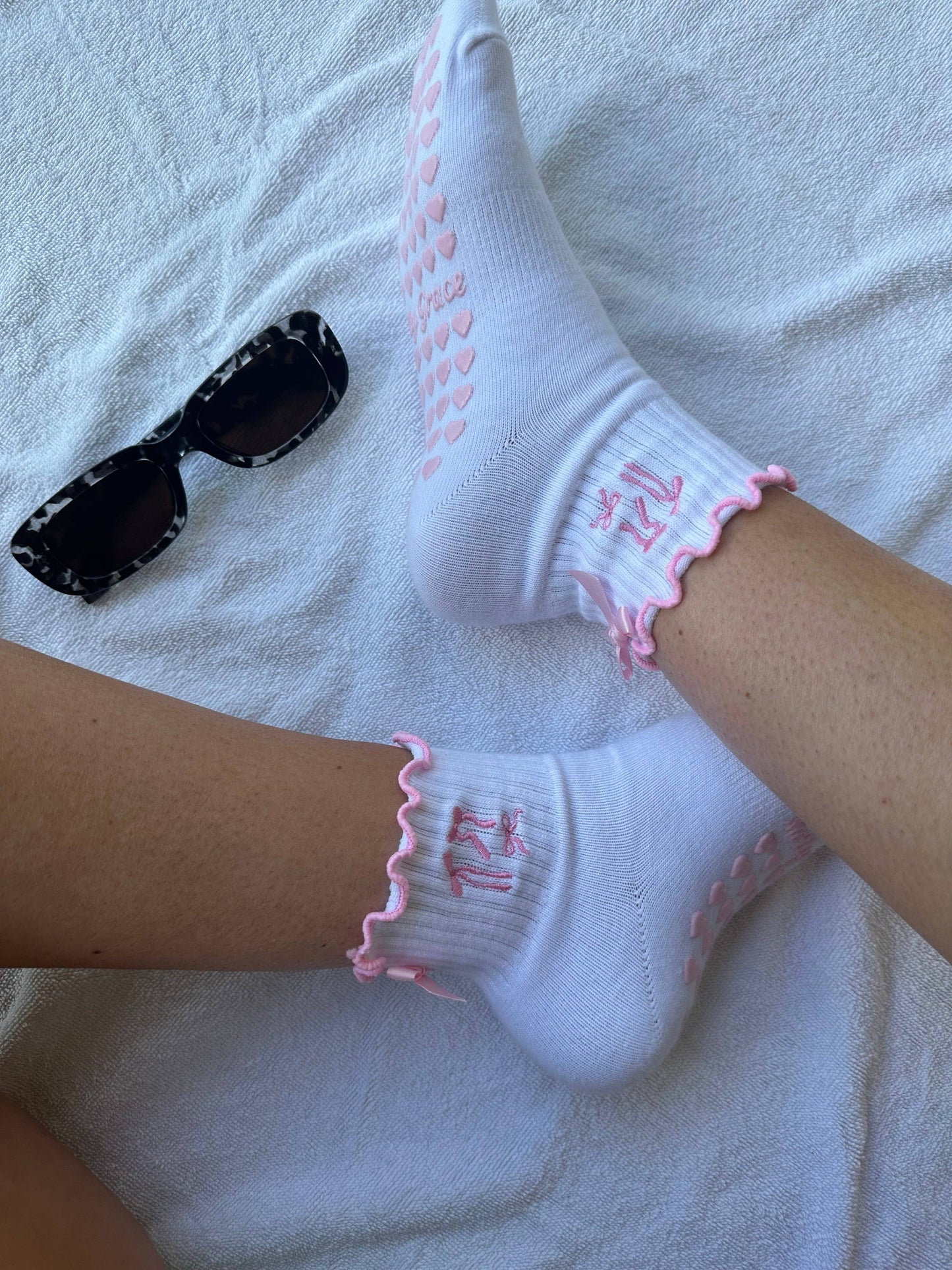 Pink bow coquette grip sock with heart grips